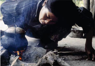 woman with solid fuel fire