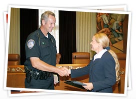 Law enforcement officer receiving thanks