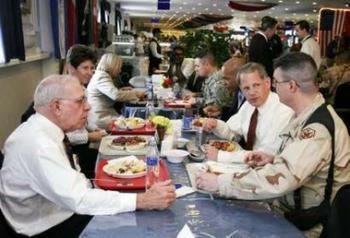 Congressman Israel eats at a mess hall in Iraq with Lt. Col Gillette whose wife is from Huntington and whose family still lives there. 