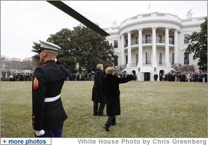 President George W. Bush and Mrs. Laura Bush wave to an awaiting crowd Sunday, Jan. 18, 2009 on the South Lawn of the White House, upon their return from Camp David aboard Marine One. White House photo by Chris Greenberg