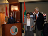 At the luncheon held during NASA’s Future Forum in Miami, NASA’s Deputy Administrator Shana Dale presents Florida Gov. Charlie Crist (on the right). At center is Donna E. Shalala, president of the University of Miami.