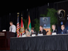 At the podium, Russell Romanella, director of International Space Station and Spacecraft Processing at Kennedy Space Center, moderates a panel presenting “Pushing the Limits of Knowledge To Inspire New Generations” during NASA’s Future Forum in Miami.