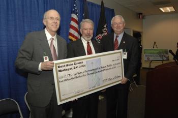 Randy presents a federal grant for research at Texas Tech