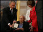 President George W. Bush presents the Congressional Gold Medal to famed heart surgeon Dr. Michael Ellis DeBakey during a ceremony Wednesday, April 23, 2008, at the U.S. Capitol. Said the President, "For nearly a hundred years, our country has been blessed with the endless talents and dedication of Dr. Michael DeBakey. And he has dedicated his career to a truly noble ambition -- bettering the life of his fellow man." White House photo by Chris Greenberg