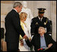 President George W. Bush offers his hand to Dr. Michael DeBakey Wednesday, April 23, 2008, after honoring the 99-year-old pioneer of bypass heart surgery during the Congressional Gold Medal Ceremony at the U.S. Capitol. White House photo by Chris Greenberg