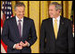 President George W. Bush stands with former Prime Minister Tony Blair of the United Kingdom as they listen to a citation honoring Mr. Blair as recipient of the 2009 Presidential Medal of Freedom. The presentation, held Tuesday, Jan. 13, 2009, in the East Room of the White House, will be the last such presentation by President Bush during his administration. White House photo by Chris Greenberg