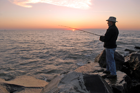 man fishing in Lake Michigan
