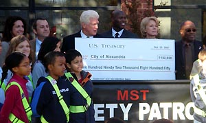 Check presentation with Mayor Euille, School Superintendent Rebecca Perry and Principal Darren Reed for Alexandria's Cora Kelly Elementary School for the design and construction of a new "green" roof.