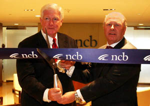 Congressman Moran and CEO William Casey Jr. cut the ribbon to open the newest National Consumer Co-op Bank located in Arlington.