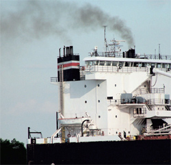 boat spewing pollution