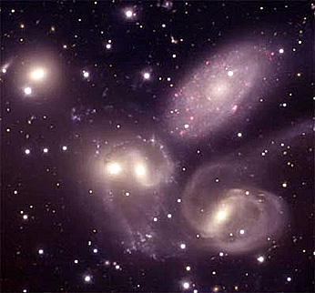 Stephan's Quintet, merging galaxies; the three on the right are NGC7318A, NGC7318B, and NGC7319.