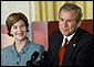 President George W. Bush and Laura Bush discuss the importance of involving families and teachers to help children read at an early age in the East Room Wednesday, April 3. Promoting the Early Childhood Education Initiative, Mrs. Bush is the honorary national chairperson of the PBS Designated Reader campaign. After their remarks, the audience of adults and children were visited by Mister Rogers and Elmo from Sesame Street. White House photo by Evan Parker.