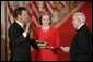 Judge John G. Roberts is sworn-in as the 17th Chief Justice of the United States by Associated Supreme Court Justice John Paul Stevens, Thursday, Sept. 29, 2005 in the East Room of the White House in Washington. Judge Roberts' wife Jane is seen holding the Bible. White House photo by Paul Morse