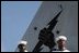 Pearl Harbor, Hawaii (Apr. 26, 2003) -- Sailors man the rails aboard the aircraft carrier USS Abraham Lincoln (CVN 72) while transiting into Pearl Harbor for a brief one-day liberty port after the ship’s 10-month deployment in support of Operation Iraqi Freedom. U.S. Navy photo by Photographer’s Mate 1st Class William R. Goodwin