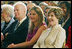 Mrs. Laura Bush and daughter Jenna Hager listen to author Jan Brett during the National Book Festival Breakfast Saturday, Sept. 27, 2008, in the East Room of the White House.