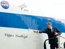Erik Lindbergh christens NASA's 747 Clipper Lindbergh with a special commemorative concoction representing local, NASA, and industry partners.