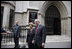 President George W. Bush and Laura Bush talk with reporters after attending Sunday morning church service at the American Cathedral of the Holy Trinity in Paris June 15, 2008.