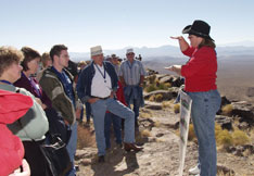 At the top of Yucca Mountain, private citizens learn about the area's geologic features.