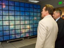 California Gov. Arnold Schwarzenegger and NASA Ames Research Center Director S. Pete Worden examine hyperwall-2, a state-of-the-art visualization system developed at Ames. Hyperwall-2 is one of the largest displays in the world and is used by scientists for data interpretation. Schwarzenegger visited Ames July 14, 2008, for a behind-the-scenes tour and briefings about NASA’s support to firefighters battling California wildfires. Ames scientists are partnering with colleagues at Dryden Flight Research Center, Edwards, Calif., to send NASA’s remotely piloted Ikhana aircraft on reconnaissance flights using sophisticated visual and thermal sensors to provide up-to-the-minute information to firefighters in the field. Photo Credit: NASA Ames Research Center / Eric James