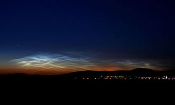 This image shows one of the first ground sightings of noctilucent clouds in the 2007 season.