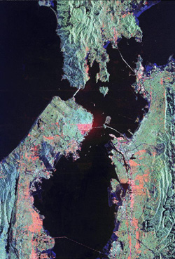 Color composite of the San Francisco Bay Area made from SIR-C L-band polarization modes of HH = red and HV = green and C-band mode of HV = blue. 