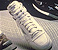 Thumbnail image of athletic shoes.