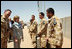 Mrs. Laura Bush greets New Zealand troops during her welcoming ceremony Sunday, June 8, 2008, at the Bamiyan Provincial Reconstruction Team Base. New Zealand's military took over the Afghanistan military compound from U.S. troops in 2003.