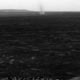 This movie clip shows several dust devils moving from right to left across a plain inside Mars' Gusev Crater.