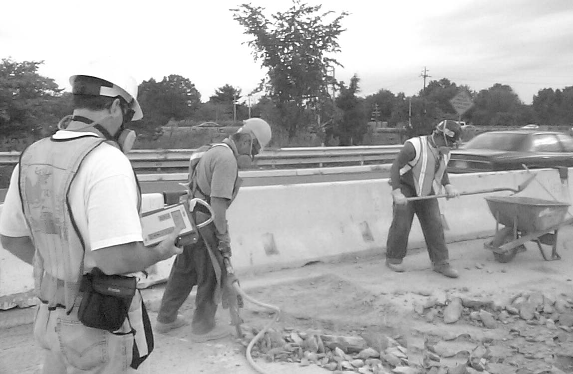 Workers at a dusty worksite