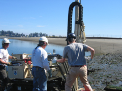 NOAA engineer Jim Wright extracts a core sample from the Geoprobe coring tool.