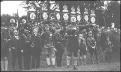 Adolf Hitler speaks at a Nazi party rally. Nuremberg, Germany, August-September 1927.