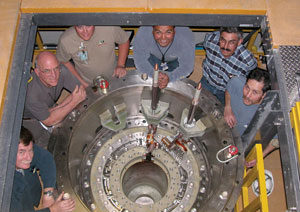 The Large Magnet Assembly Team surrounds the 100-tesla multi-shot magnet without the insert coil