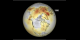 This animation shows anomalous arctic temperature  from 1880 through 2000. The North Polar region remains at normal temperatures (shown in grey) until 1950 when warmer temperatures (shown in red) appear.  