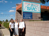 Lisa Staten, Anne Hill, and Jill Guernsey de Zapien, of the Southwest Center for Community Health Promotion, stand outside the center's promotora outreach office in Douglas, AZ. The center, one of CDC's 33 Prevention Research Centers, is housed at the University of Arizona's Canyon Ranch Center for Prevention and Health Promotion.