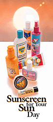 Photo of various types of sunscreen: lotions, creams, pump sprays, lip balm.