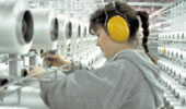 Worker wearing hearing protection