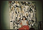 [Joan Mitchell with her painting <i> Untitled </i>(1951) in her parents apartment in Chicago]