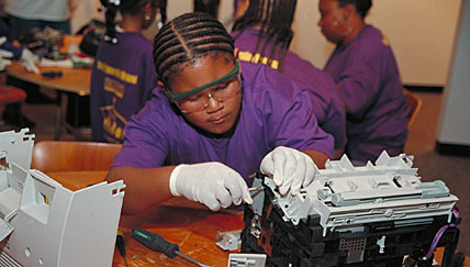 Visitor participates in hands-on activity