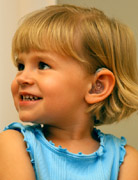 Image of a girl wearing a hearing aid