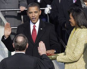 Date: 01/20/2009 Location: Washington, DC Description: Barack Obama, left, joined by his wife Michelle, takes the oath of office from Chief Justice John Roberts to become the 44th president of the United States at the U.S. Capitol in Washington. © AP Photo