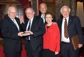 Photo of Vice President Cheney, Senator Carl Levin, Vice President-elect Joe Biden, Barbara Levin and Rep. Sander Levin in the old Senate Chamber.  This was a ceremonial reenactment of Senator Levin taking the oath of office.
