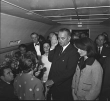 Sarah T. Hughes, U.S. District Judge, Northern District of Texas, administering oath of office to Lyndon B. Johnson in the Conference Room aboard Air Force One at Love Field, Dallas, Texas, November 22, 1963 (Lyndon Baines Johnson Library and Museum, Austin, Texas)