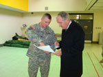 LTC Stephen Boesen, Commander, 1-168th and Senator Tom Harkin talk about the assignment the Iowa National Guard will carry out while in Washington, D.C.