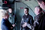 Senator Murray speaks with crew members of a KC-135R about the yearly work required to maintain the planes.