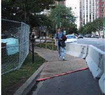 Case Study: Photo showing temporary pedestrian route around construction. See case study discussion for detail.