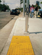 Case Study: Photo of midblock crossing with detectable warnings and APS.