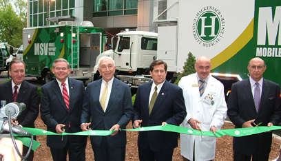 Senator Lautenberg prepares to cut the ribbon at the unveiling of a mobile emergency trauma unit at Hackensack University Medical Center. He is joined by John Ferguson, President of the Center; Senator Robert Menendez (D-NJ); Rep. Steve Rothman (D-NJ-09); Dr. Joseph Feldman, Chairman of the Center's Trauma Department; and Robert Torre, Executive Vice President of the Center's Foundation. Lautenberg, Menendez and Rothman helped secure the funds for the trauma unit in partnership with the Defense Department's Regional Bio-Defense Response Program. (October 9, 2007)