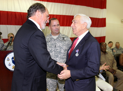 Senator Lautenberg receives the New Jersey Distinguished Service Medal from Governor Jon Corzine and Major General Glenn K. Rieth, the Adjutant General for the New Jersey National Guard, at Fort Dix. The Senator was also at the fort to see off nearly 3,000 members of the 50th Infantry Brigade Combat Team of the New Jersey Army National Guard before they depart for their final months of training in Texas. (June 14, 2008)