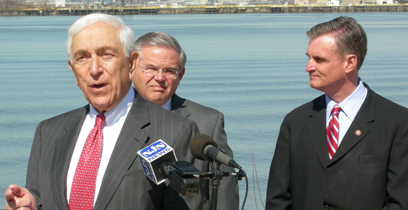 Senator Lautenberg stands with Sen. Robert Menendez (D-NJ; left) and Rep. Robert E. Andrews (D-NJ-01) in West Deptford, N.J. in front of the Delaware River and across from Philadelphia International Airport. At a press conference, the three federal officials called on the Federal Aviation Administration (FAA) to stop implementation of its airspace redesign plan due to concerns with the plan's safety raised by air traffic controllers at Philadelphia Airport and increased noise levels for some 300,000 in the New Jersey region. (March 25, 2008)