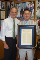 Senator Carper presents a Congressional Record Statement to the Delaware History Teacher of the Year